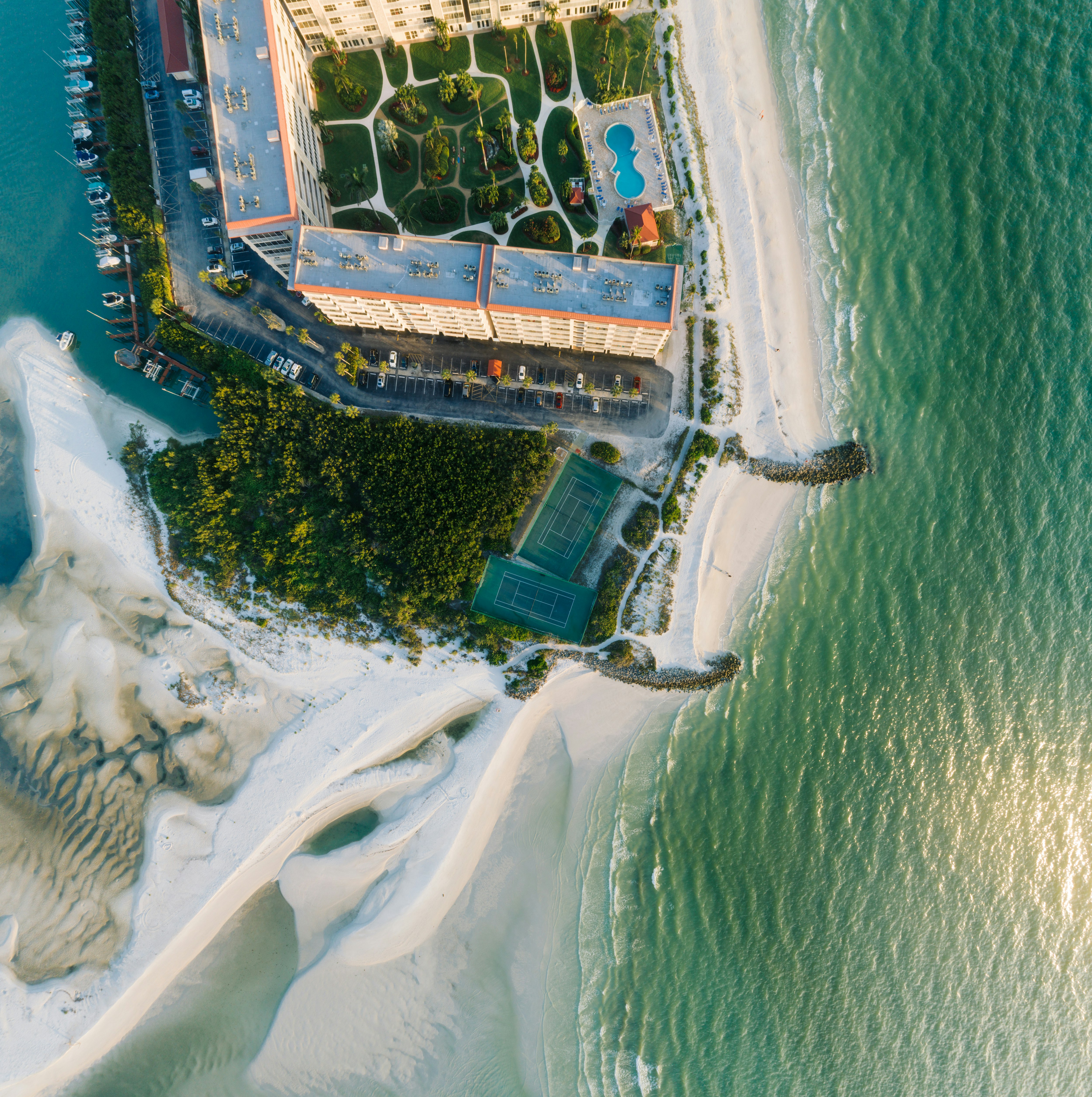 aerial photography of high rise building near ocean